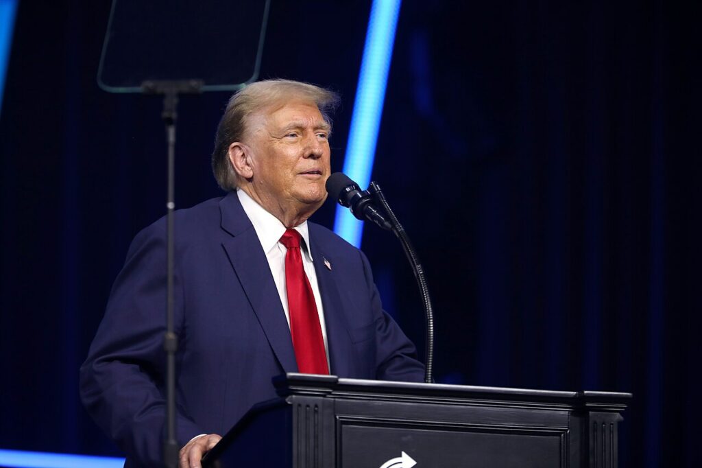 Former President of the United States Donald Trump speaking with attendees at The People's Convention at Huntington Place in Detroit, Michigan.